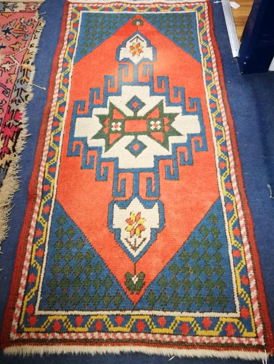 A Persian design runner 136 x 66cm